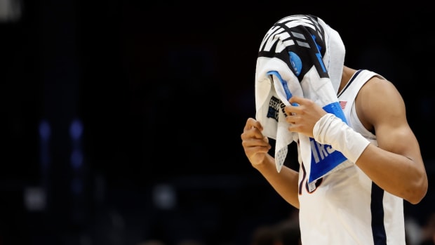 Virginia Cavaliers guard Ryan Dunn (13) leaves the court after being defeated by the Colorado State Rams at UD Arena in Dayton, Ohio, on March 19, 2024.